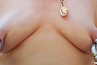 nippleringlover kinky mother pumping pierced tits inserting big double rings in extreme pierced nipples outdoors