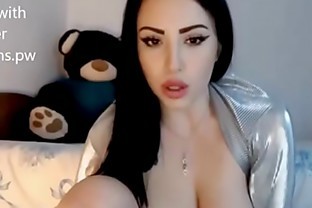 Hot girl in silk chatting live on webcam showing boobs poster