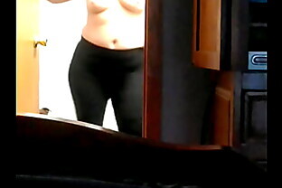 Wife undressing on hidden cam  6 poster