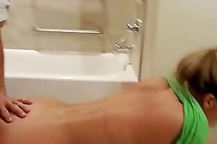 Bending wife over in hotel bathroom