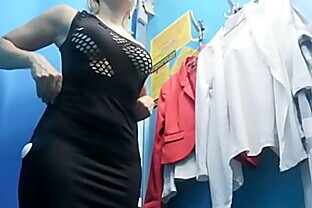Dressing room. Hidden camera. Russian girl with big boobs and nipples poster