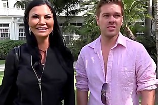 Jasmine Jae is a hot MILF with big tits and a pierced clit. The trio go to the beach where Jasmine exposes her pussy for the public to see! poster