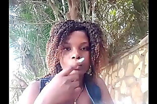 Haitian girl eating at a plain air restaurant showing her boobs 2 min poster