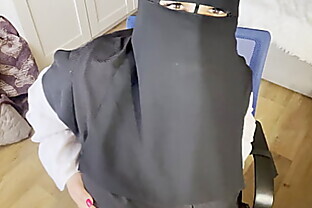 A Turkish woman with beautiful eyes in a hijab masturbates in pantyhose