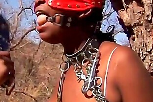 t. African slut outdoors tied up big tits poster
