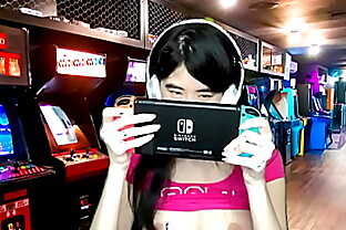 Chinese gamer girl goes topless poster