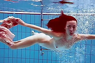Martina gorgeous redhead teenie big tits swimming