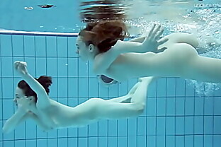 Two dressed beauties underwater Anna Netrebko and Lada Poleshuk