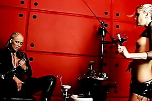 Fetish lesbians fucks their asses with a long toy