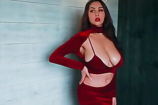 Lady in red with giant natural tits in red outfit poster